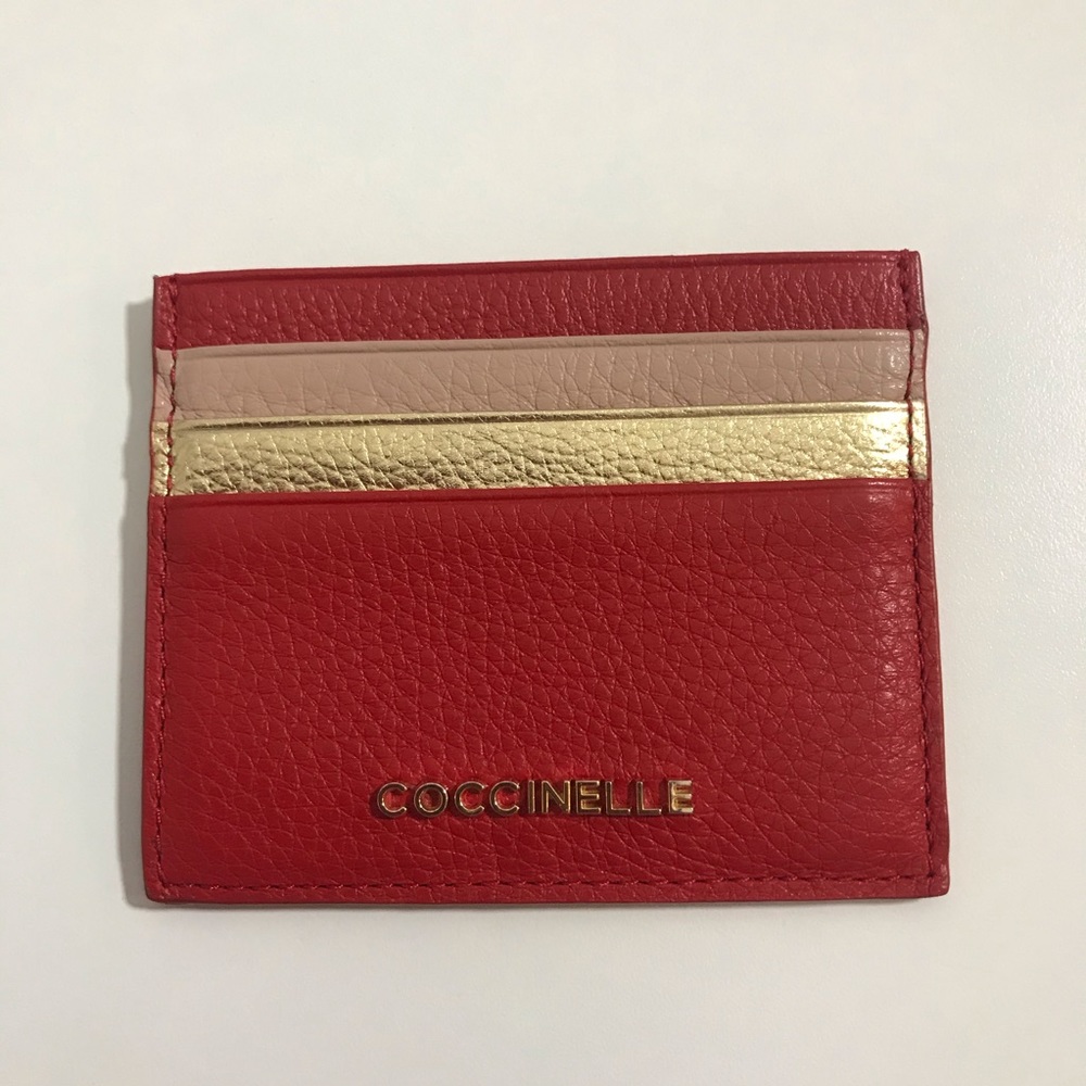 Sold. New Coccinelle card holder. Lucky color.